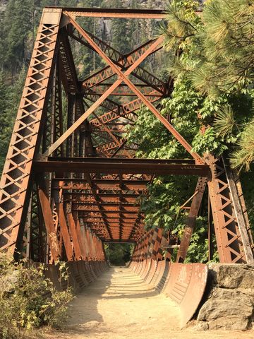 The bottom half of the pipeline serves as the trail across the bridge