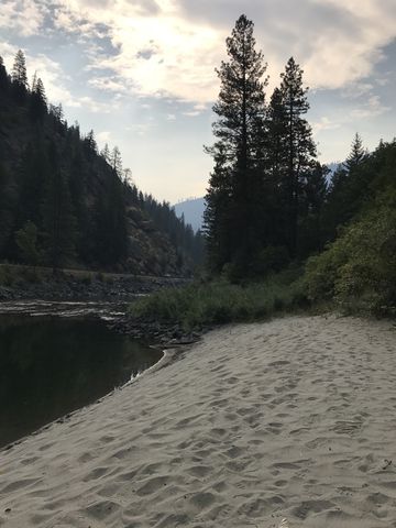 A sandy beach on the river. Do NOT swim due to swift currents