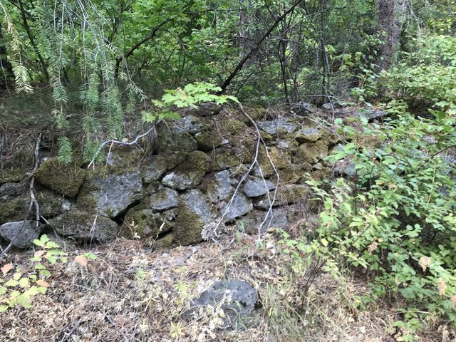 Boulder wall along the trail dating back to the pipeline days