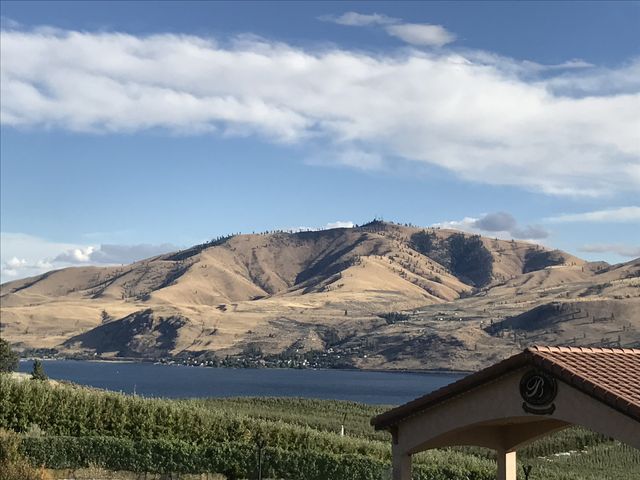 Chelan Butte, taken from the north side of Lake Chelan (Benson Vineyards to be exact; nice Syrah)