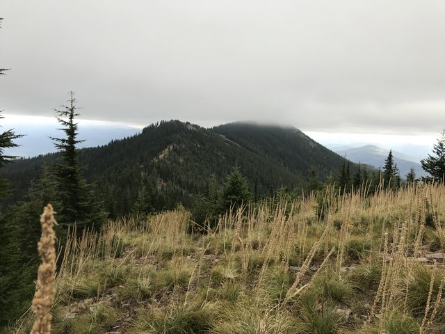 The clouds nipping at Pond Peak in the distance