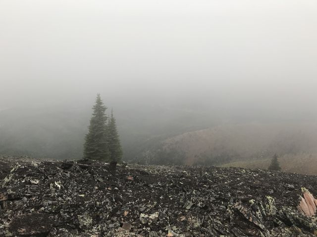 Clouds whipped fiercely across the peak