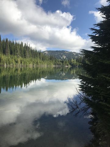 Lower Glidden Lake, looking north, with a lone fishing boat on the lake