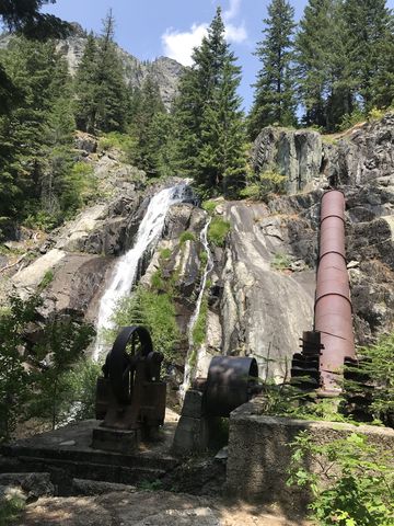 Waterfall and old mining equipment