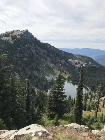 Larkins Lake huddling below Larkins Peak