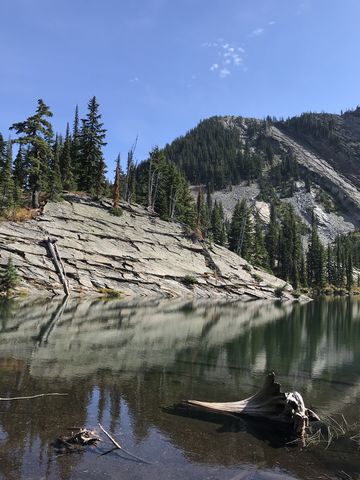 A sheer granite slab disappering into Upper Wanless Lake #2